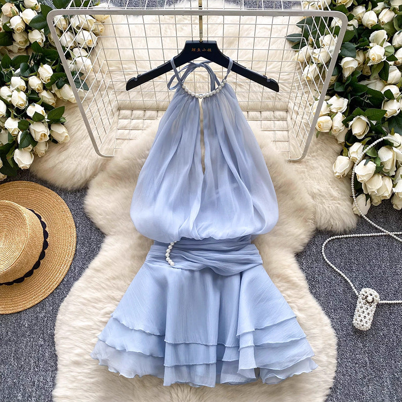 Halter neck beaded mini dress with ruffled chiffon