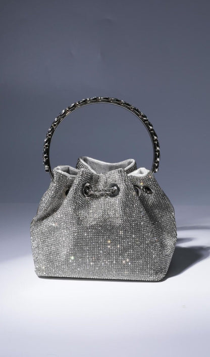 CRYSTAL EMBELLISHED BUCKET BAG IN SILVER