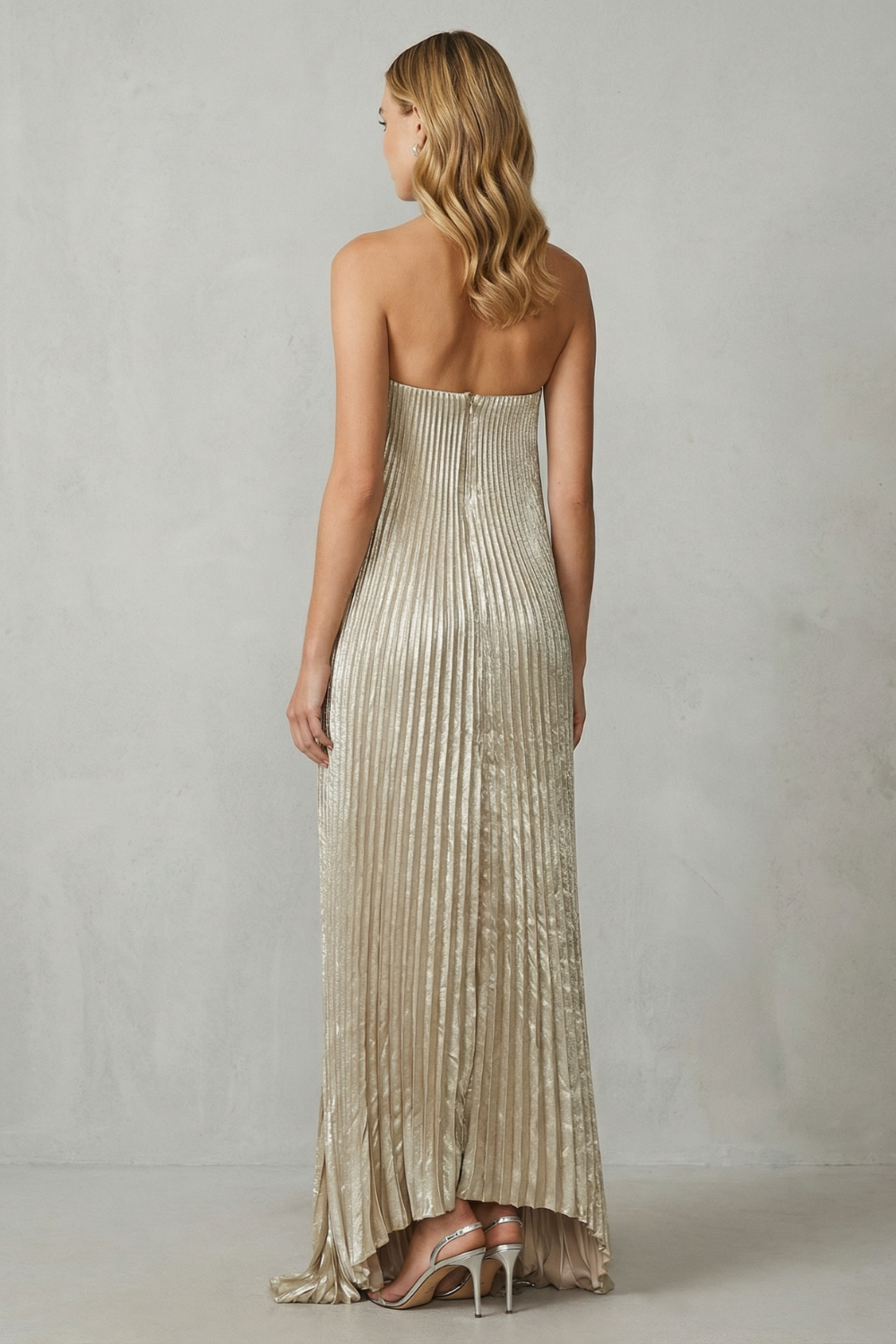 Élodie – Luminous pleated flow – Strapless metallic gown