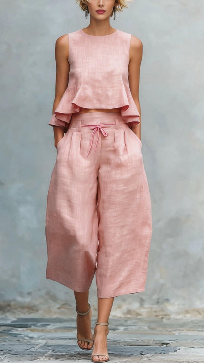 Women's two-piece linen blend set with ruffled trim.
