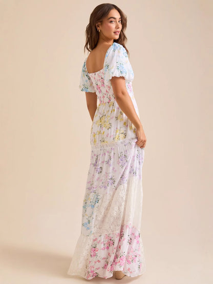 Puff-sleeved printed pleated lace strapless maxi dress