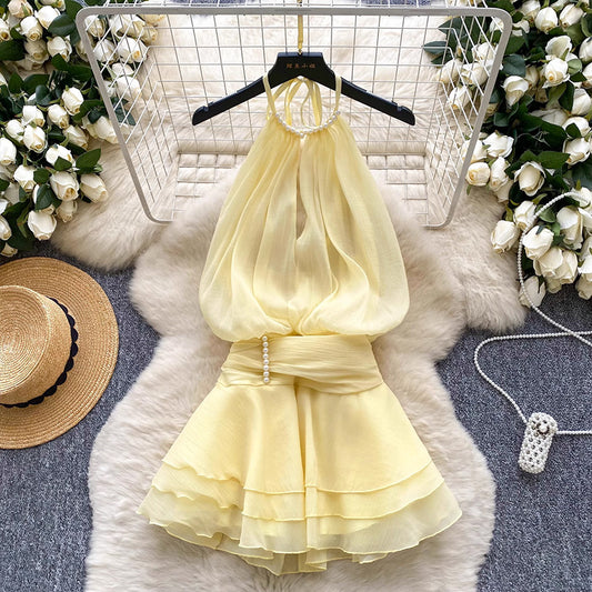 Halter neck beaded mini dress with ruffled chiffon