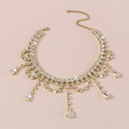 GOLD RHINESTONE TASSEL CLAW CHAIN