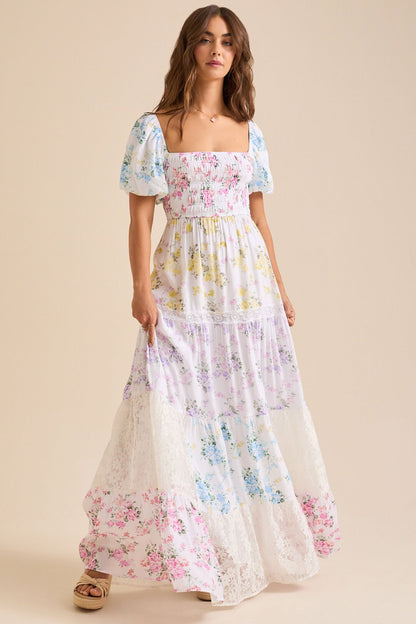 Puff-sleeved printed pleated lace strapless maxi dress
