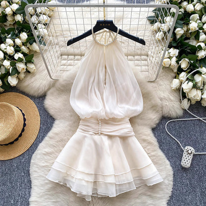 Halter neck beaded mini dress with ruffled chiffon